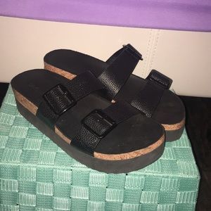 Double buckle platform slides